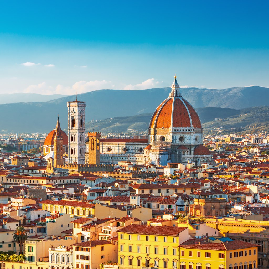 Florence city and the Cathedral of Santa Maria del Fiore at sunrise.