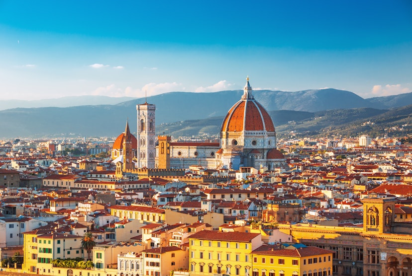 Florence city and the Cathedral of Santa Maria del Fiore at sunrise.