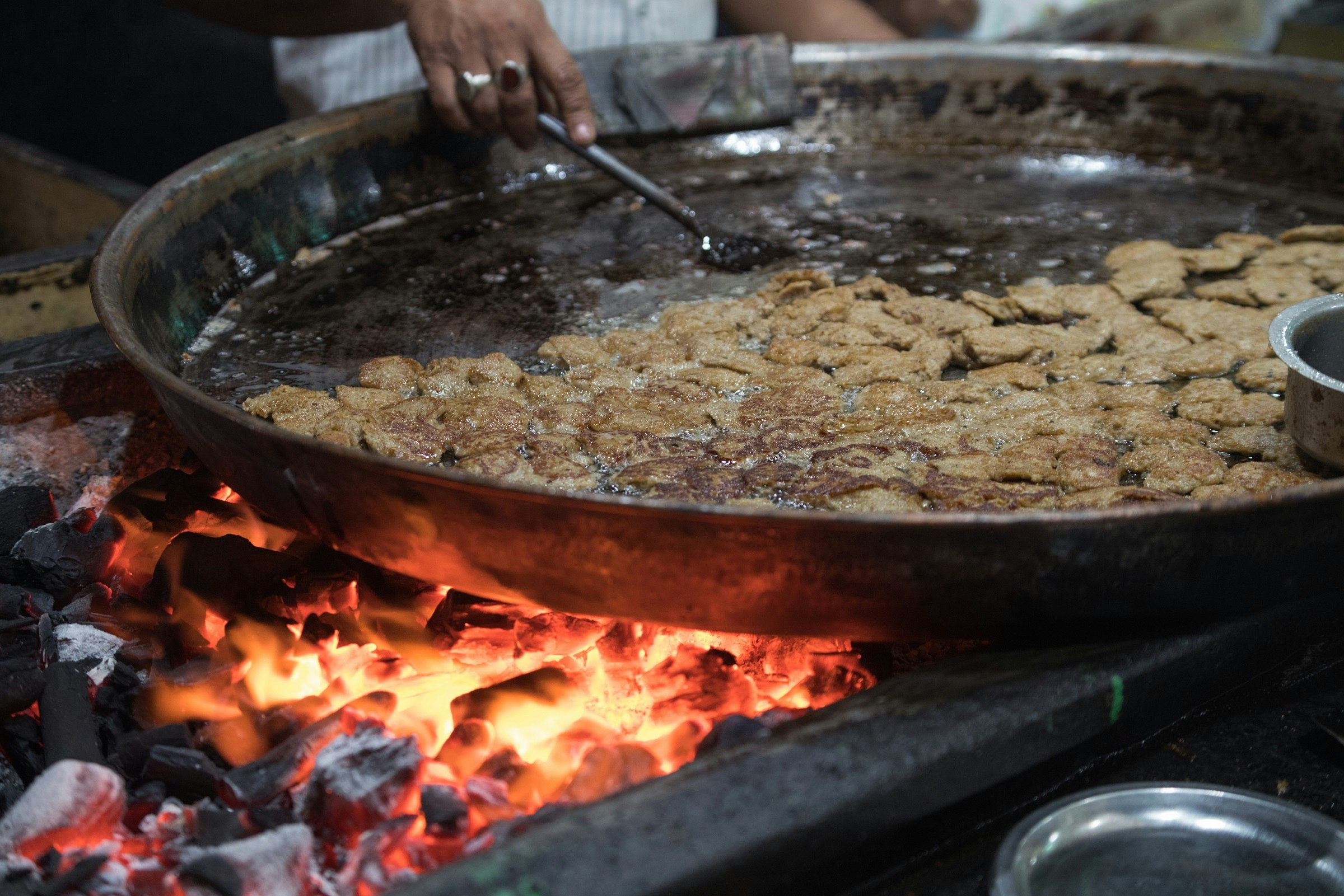 Cooking kakori kebab in Lucknow, India