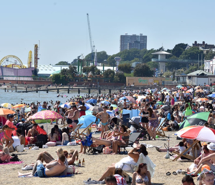 SOUTHEND-ON-SEA, ENGLAND - JUNE 25: A general view of as crowds of people gather on the beach on June 25, 2020 in Southend-on-Sea, England. The UK is experiencing a summer heatwave, with temperatures in many parts of the country expected to rise above 30C and weather warnings in place for thunderstorms at the end of the week. (Photo by John Keeble/Getty Images)