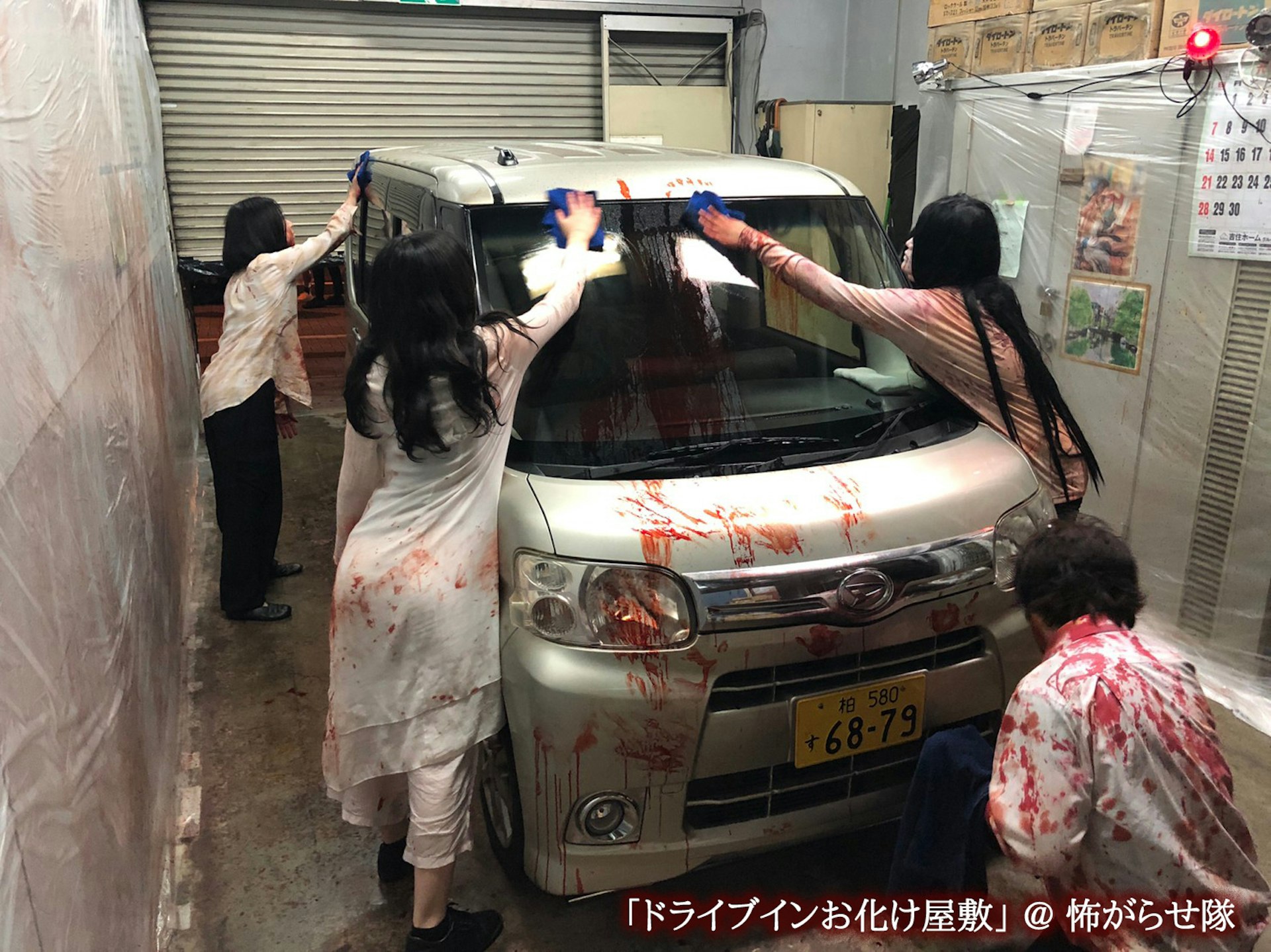 Vehicles are cleaned down by Kowagarasetai