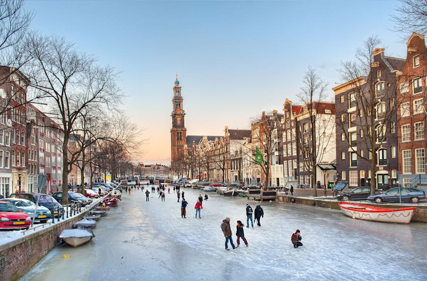 Skaters on the iced-over canals of Amsterdam, the Netherlands