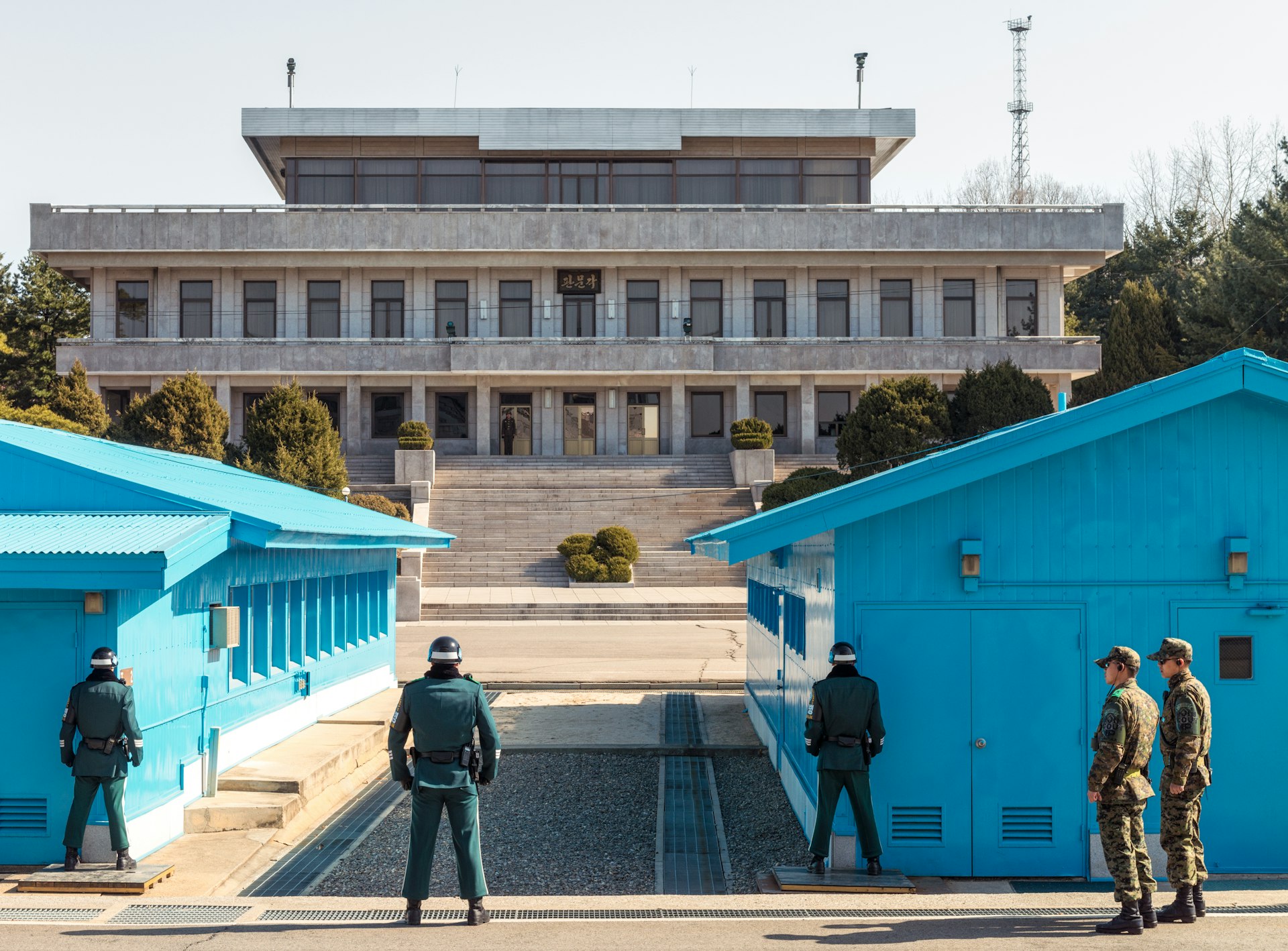 Soldiers facing each other across the border between North and South Korea