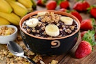Typical Brazilian berry fruit served in a bowl with banana slices and granola