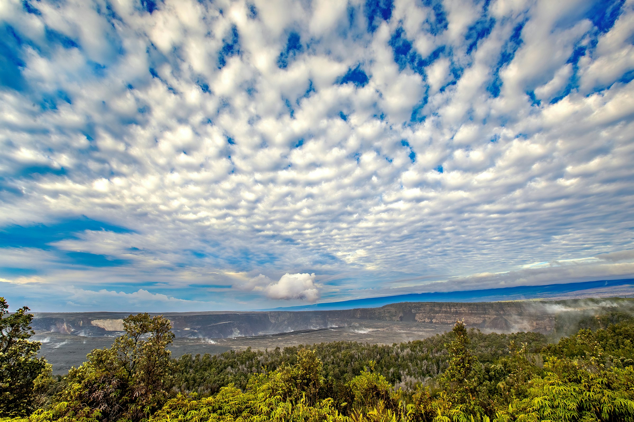 A spectacular morning sky above Kīlauea caldera in Hawaiʻi Volcanoes National Park, taken behind Volcano House