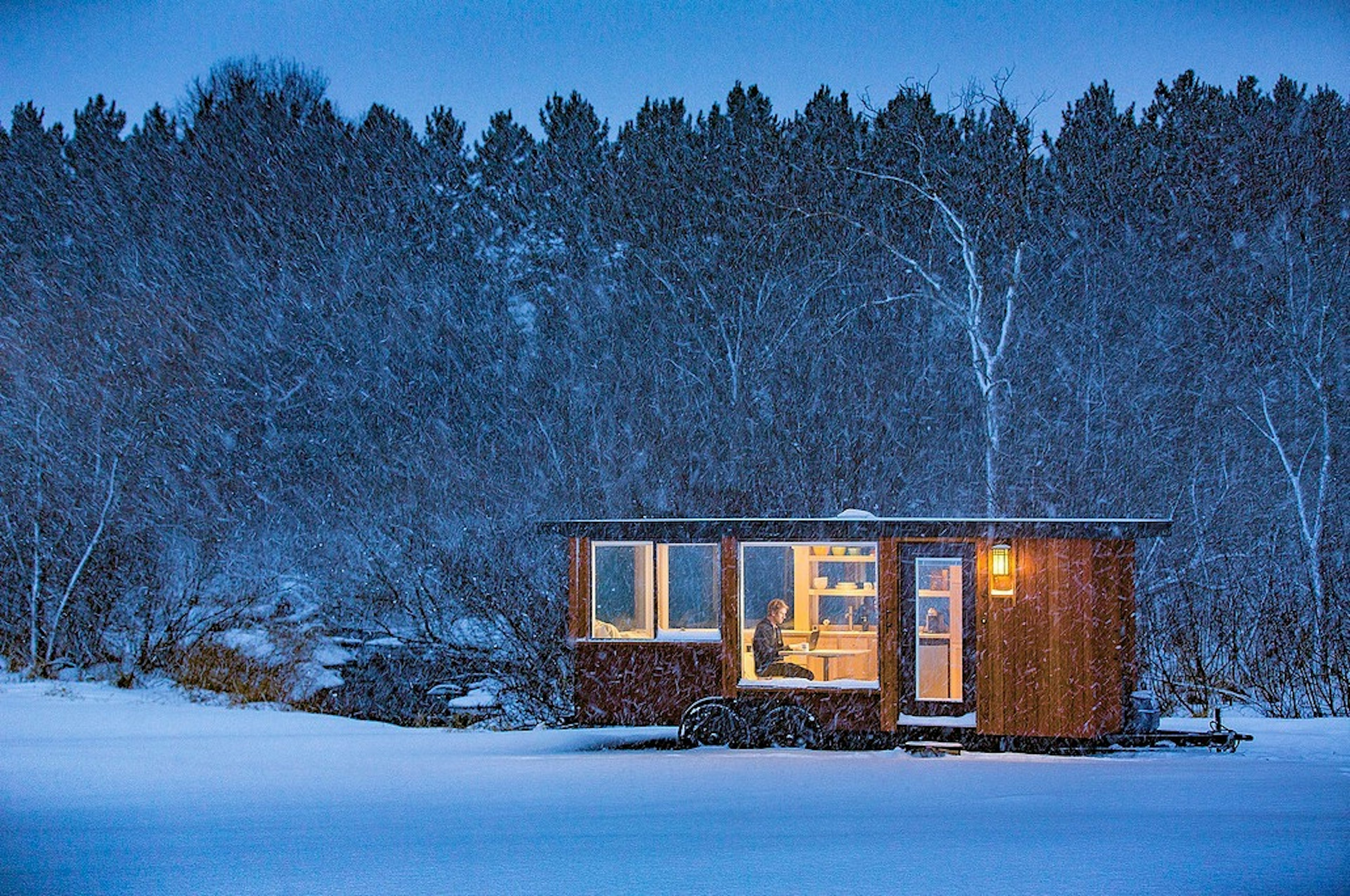 The Glass House in the Hudson Valley, lit up at night