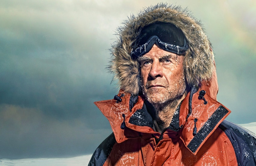 Ranulph Fiennes on an expedition, wearing Arctic gear with snow and ice forming around his head