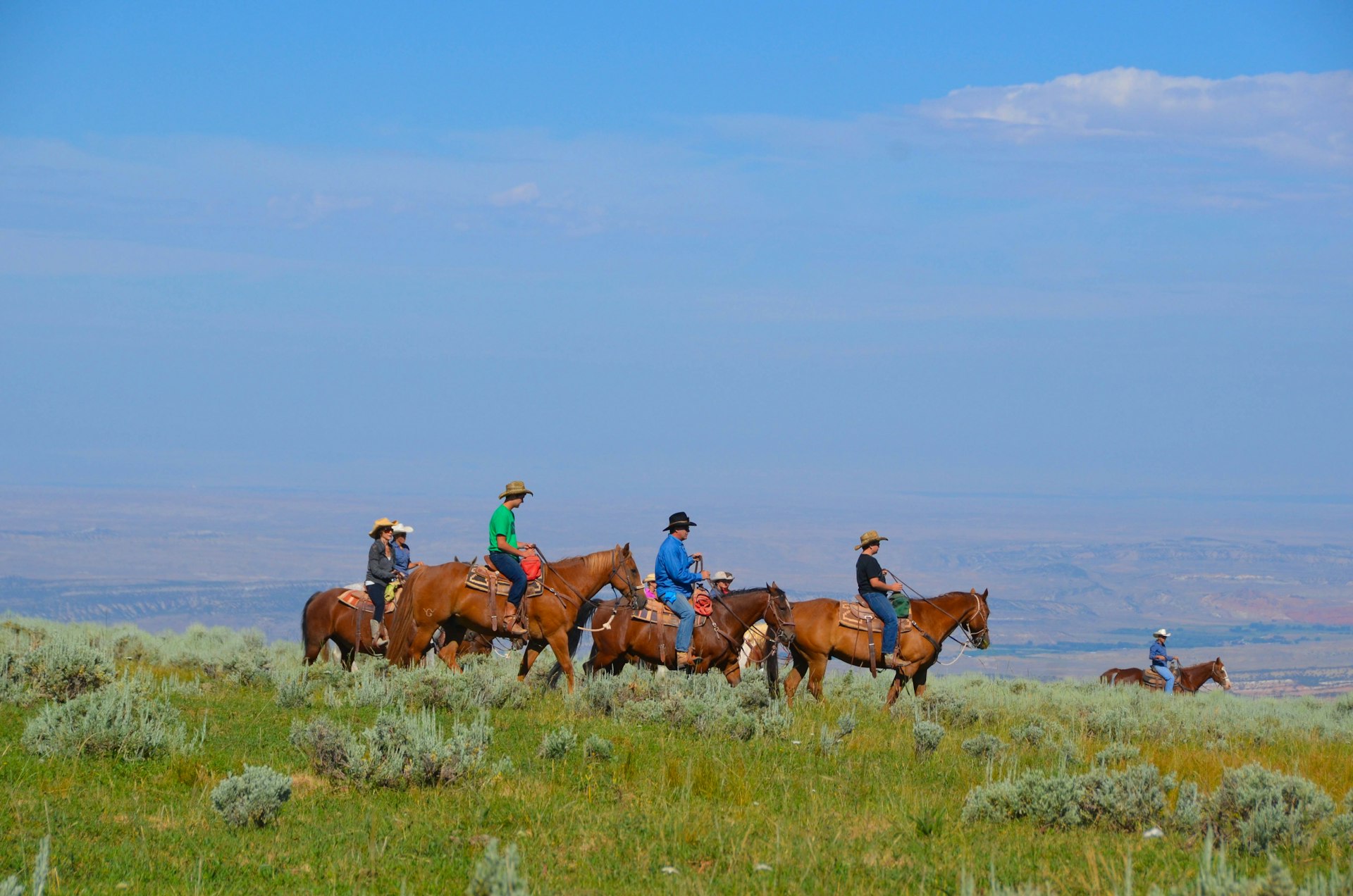 A group of people on horseback at Red Reflet Ranch