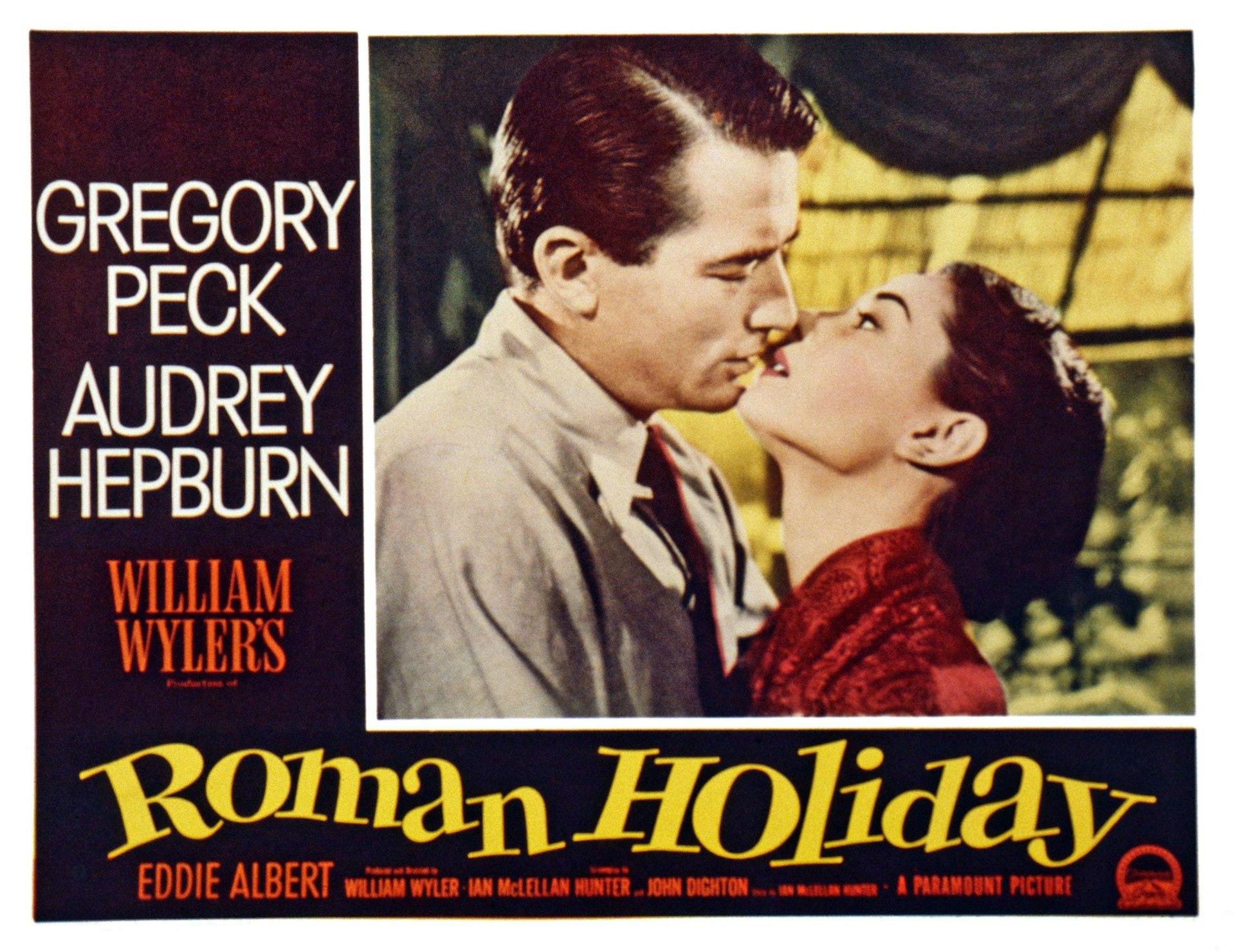 Movie poster of Gregory Peck and Audrey Hepburn for the movie Roman Holiday.