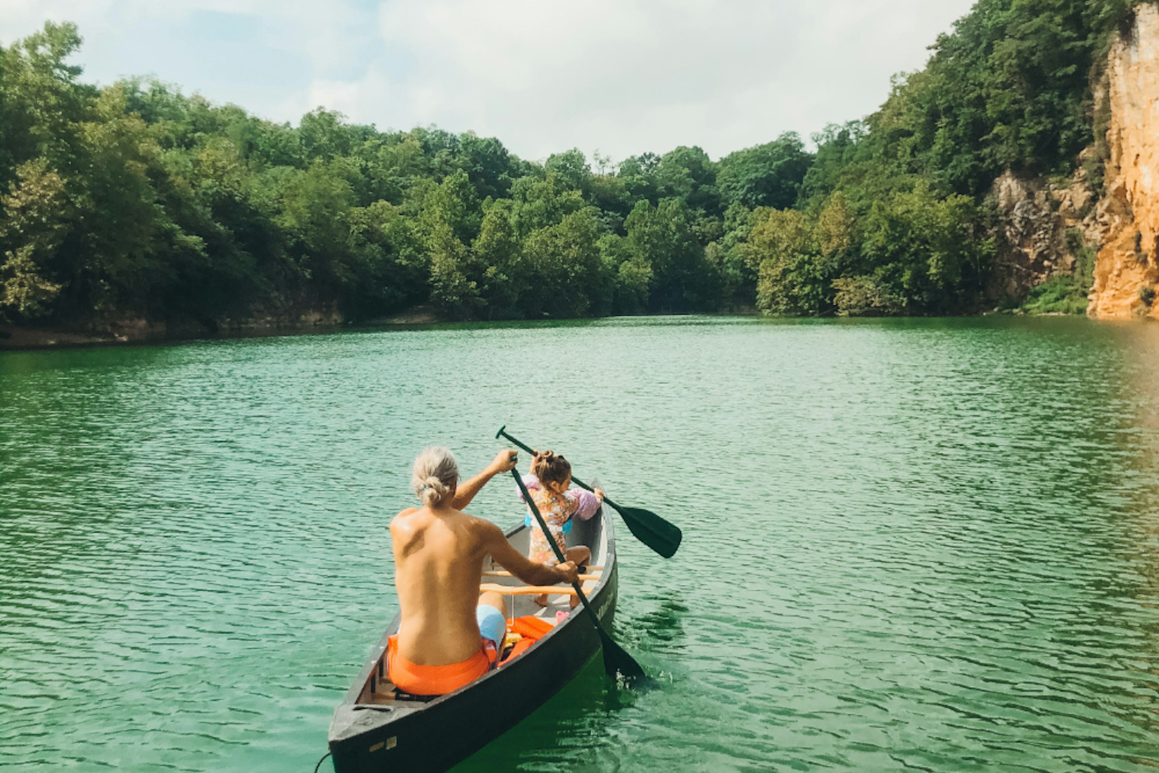 Two people in a canoe on a lake