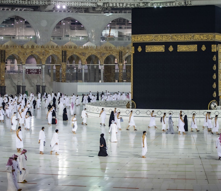 A handout picture provided by the Saudi Ministry of Hajj and Umrah on October 4, 2020, shows Saudis and foreign residents circumambulating the Kaaba (Tawaf) in the Grand Mosque complex in the holy city of Mecca, as authorities partially resume the year-round Umrah for a limited number of pilgrims amid extensive health precautions after a seven-month coronavirus hiatus. (Photo by - / Saudi Ministry of Hajj and Umra / AFP) (Photo by -/Saudi Ministry of Hajj and Umra/AFP via Getty Images)