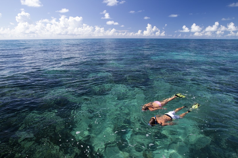 Models Cody Wagner and Katherine Wieland snorkeling at Grecian Rocks, Key Largo, a shallow reef, popular with visitors to the Florida Keys National Marine Sanctuary
