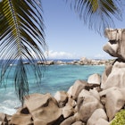 Smooth rocks on the shore at Anse Marron on La Digue Island.