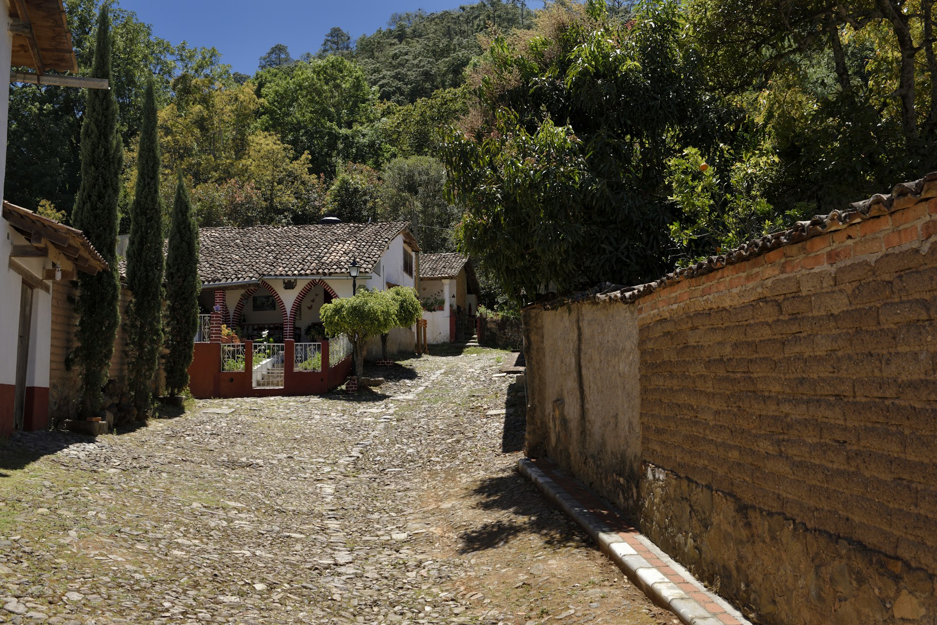 Hillside houses on stone road in San Sebastian del Oeste Jalisco Mexico