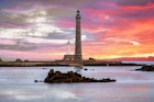 Prise de vue  du phare de l'île Vierge, le plus haut d'Europe en granit, construit entre 1897 et 1902, d'une hauteur de 84 mètres, au zoom 18/135, 200 iso, f 18, 1/160 seconde