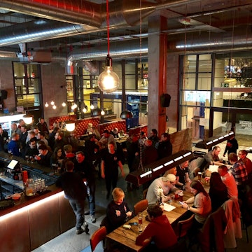 MARCH 3, 2018: Customers eat and drink inside Brewdog Lothian Road craft beer bar in Edinburgh.