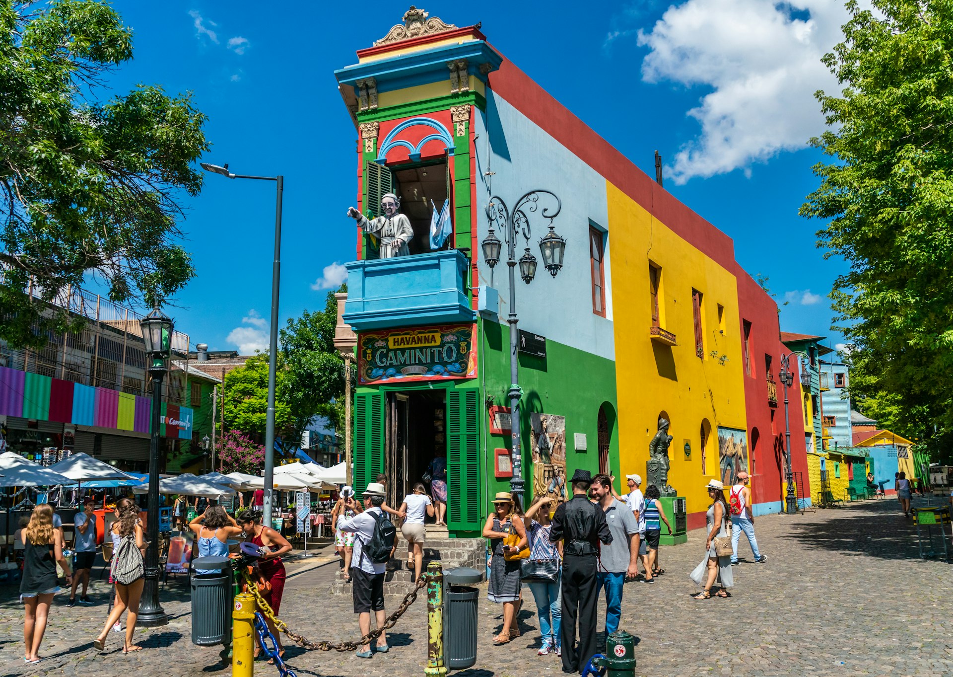 Tourists visiting the famous coloured houses of La Boca, Buenos Aires