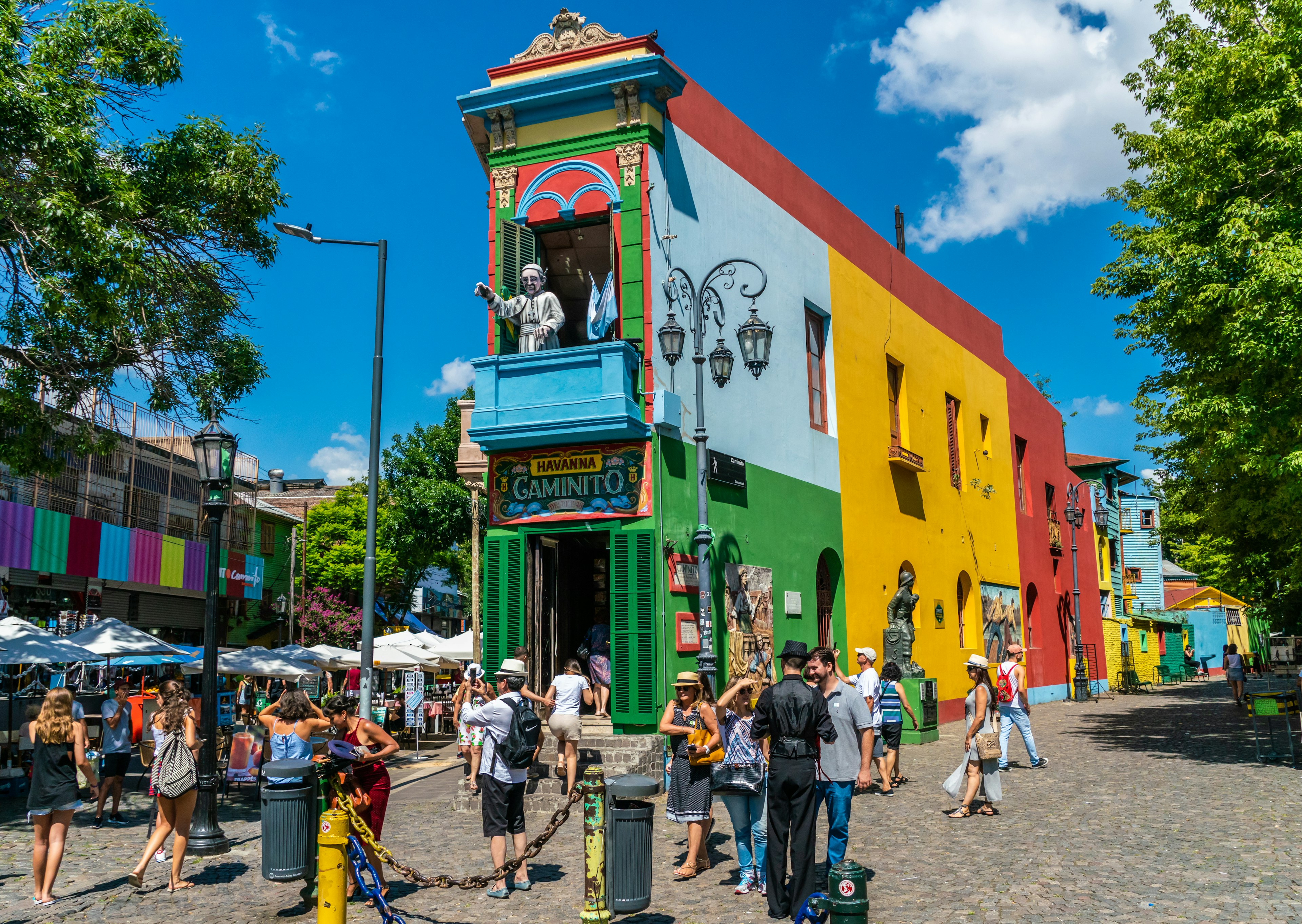 Tourists visiting the famous coloured houses of La Boca, Buenos Aires