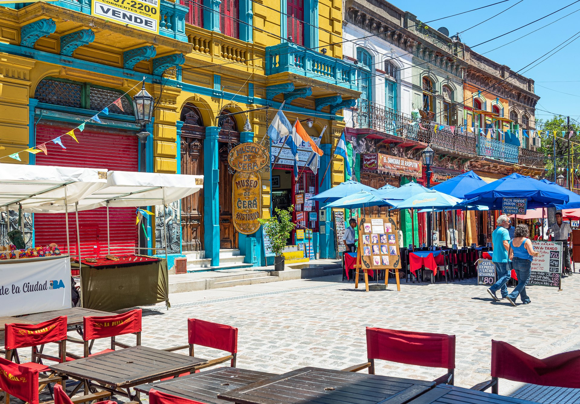 Brightly coloured buildings lining a street