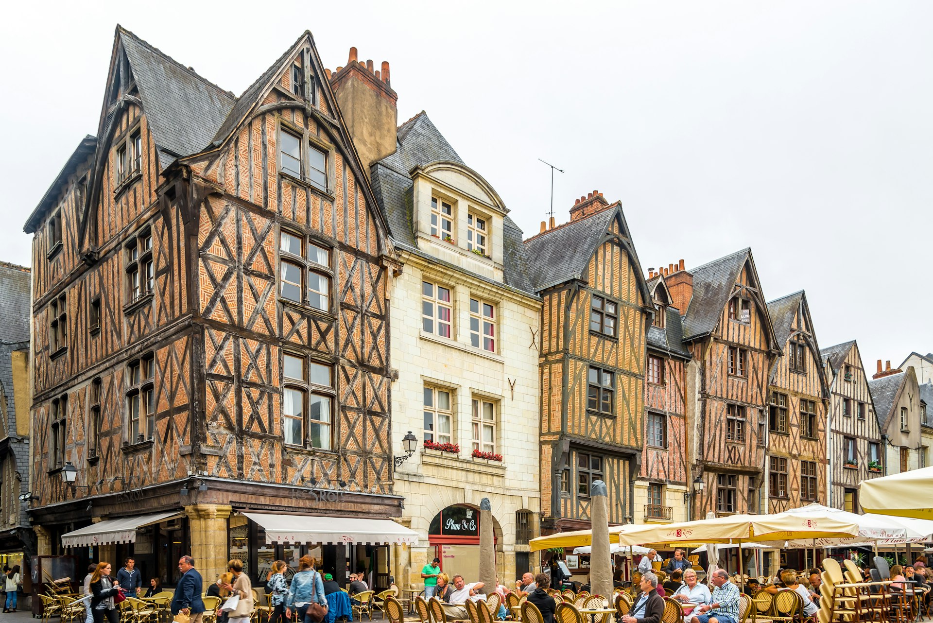 Medieval timbered houses surround a pedestrianised square