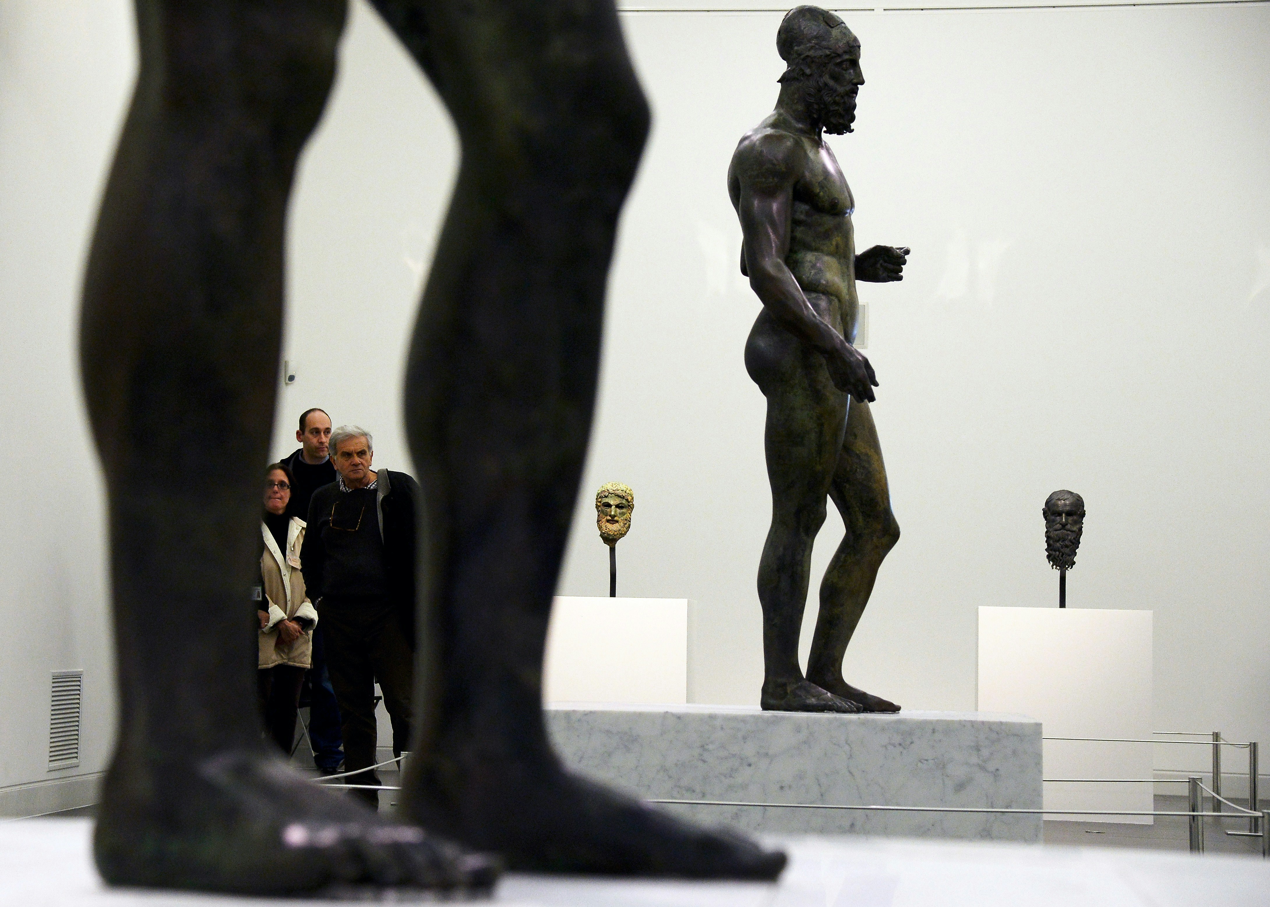 A picture of the famous Riace Bronzes in their museum