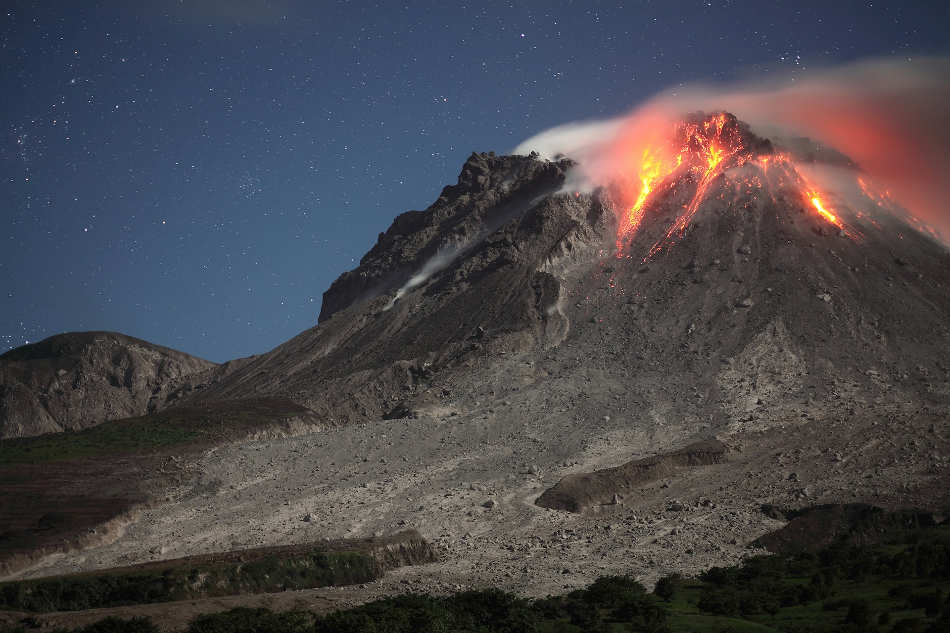 The Soufriere Hills Volcano incandescent lava dome at night