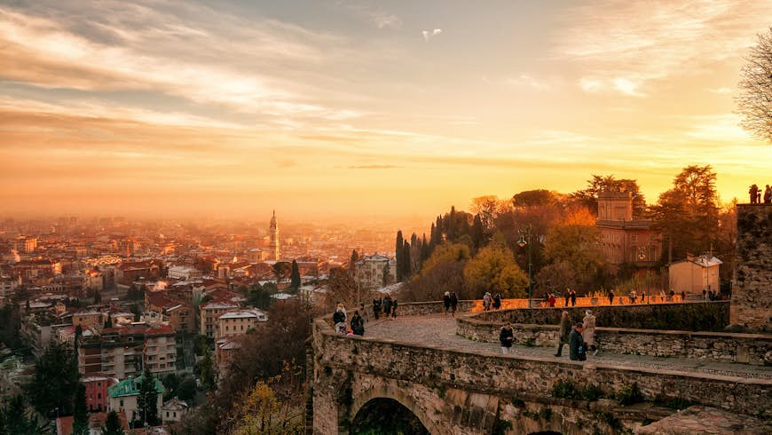 A view of Bergamo from an elevated point as the sun sets
