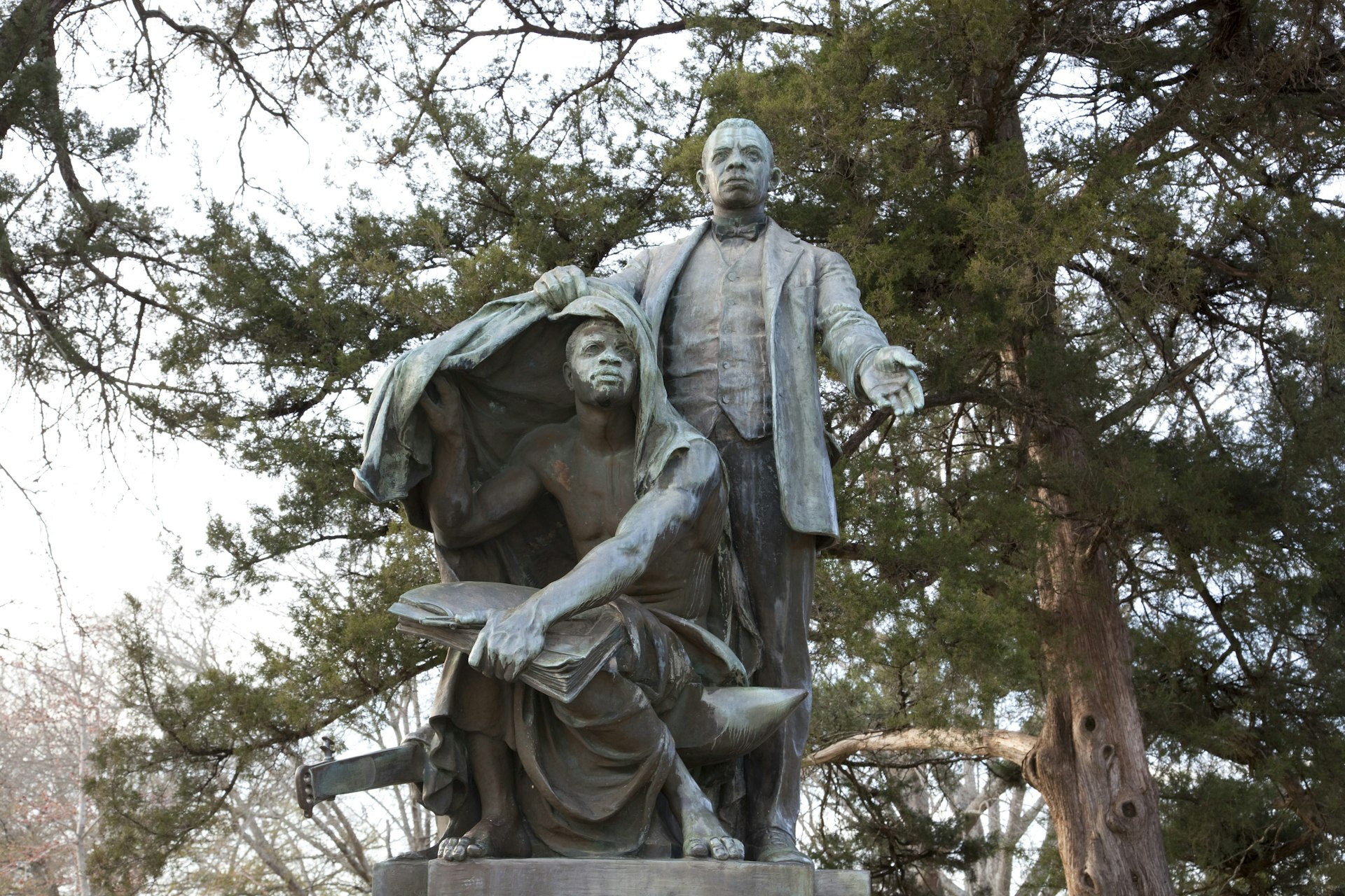 Statue of Booker T. Washington "lifting the veil of ignorance" from an enslaved man on the Tuskegee University campus 