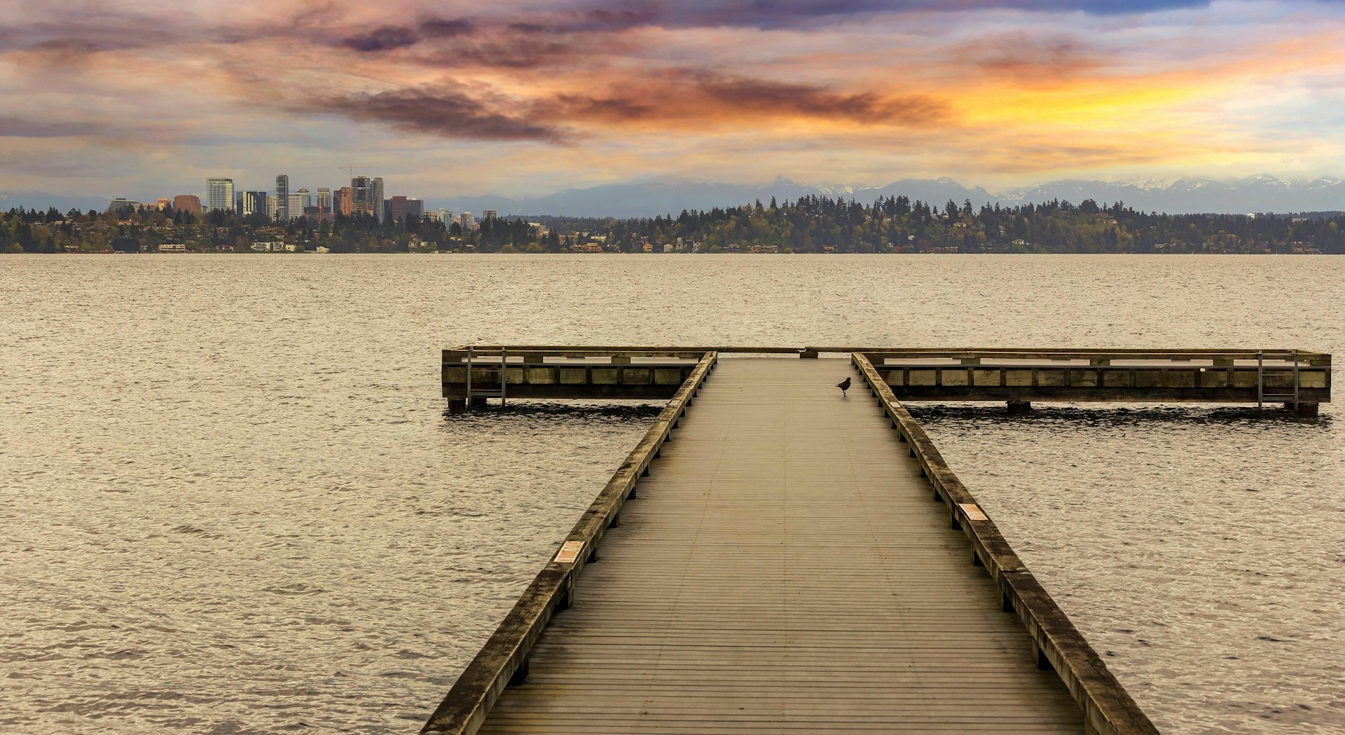 The Dock at Madrona Beach on Washington Lake in Seattle during sunset.