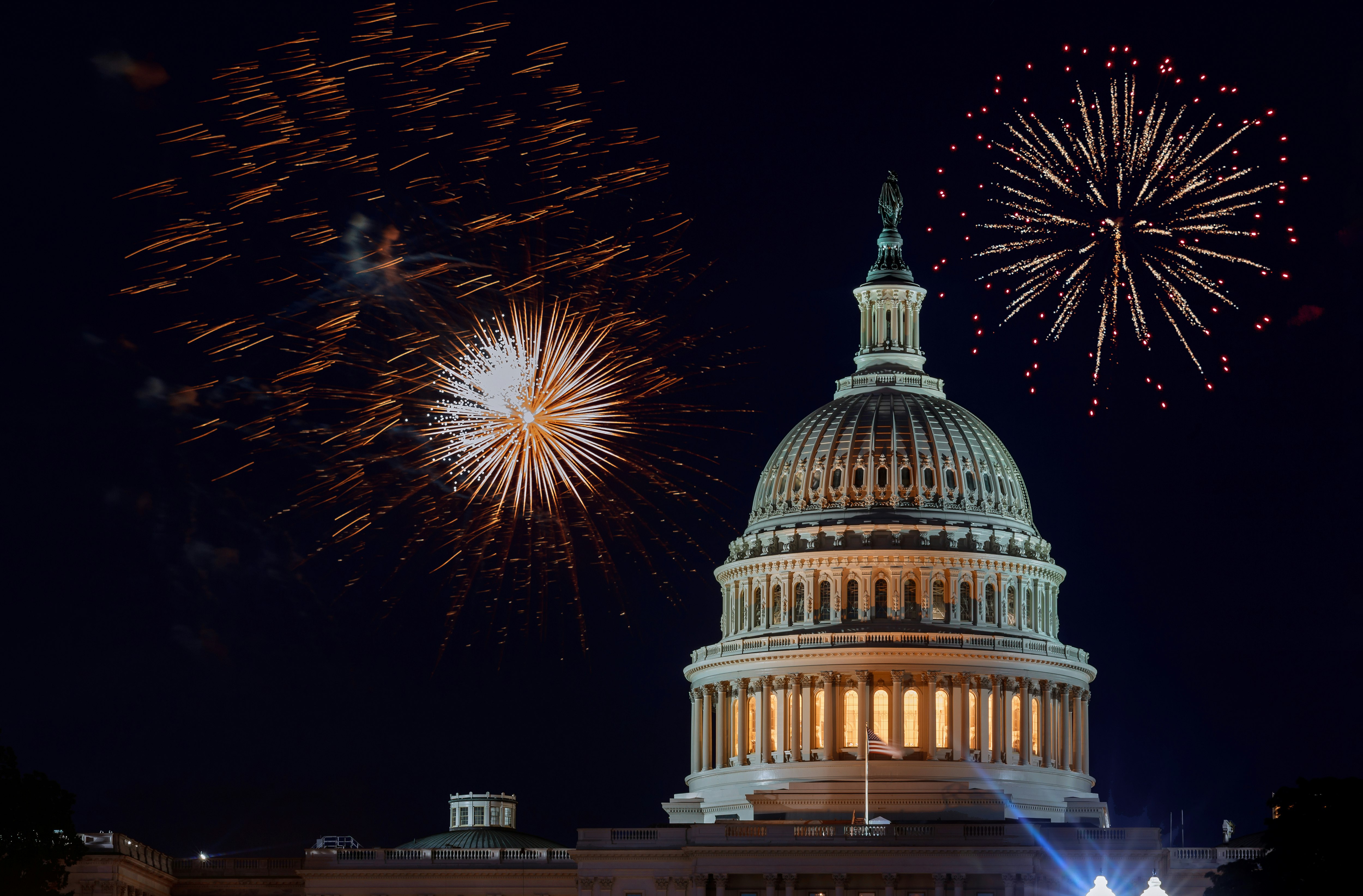 Celebratory fireworks of Independence Day above the Capitol building in Washington DC