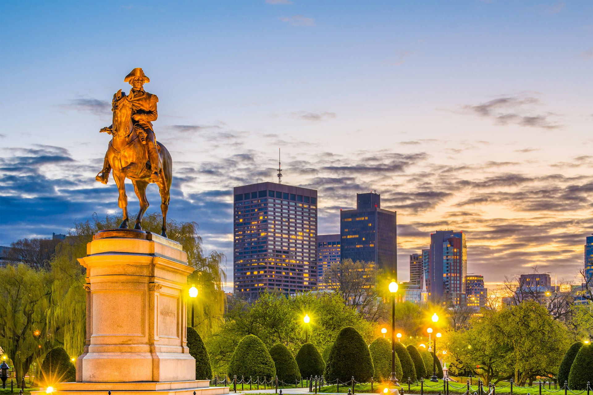 The skyline of Boston's Public Garden at sunset 