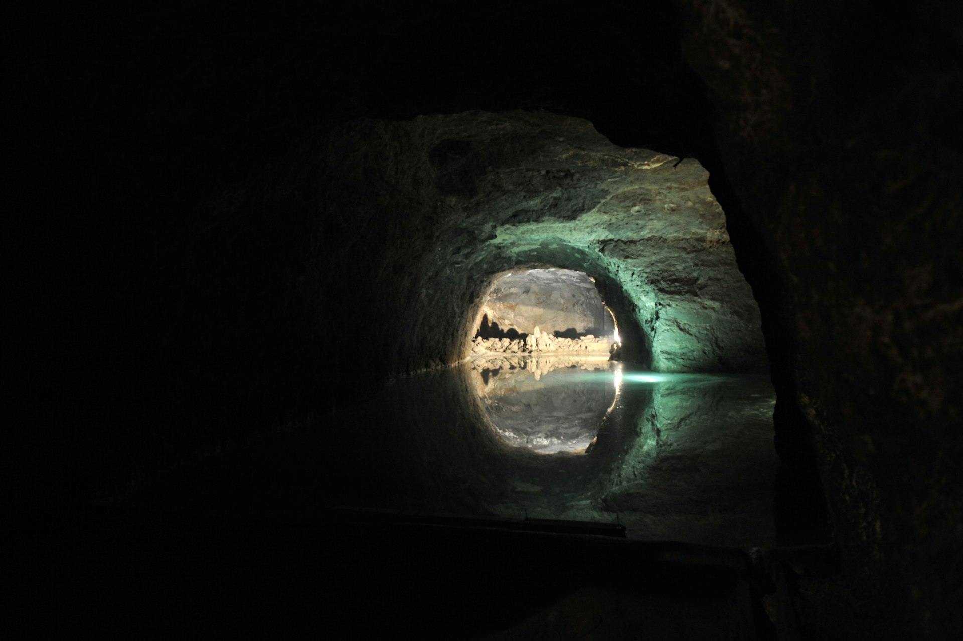 The water glows against the caves inside Seegrotte mine in Hinterbrühl