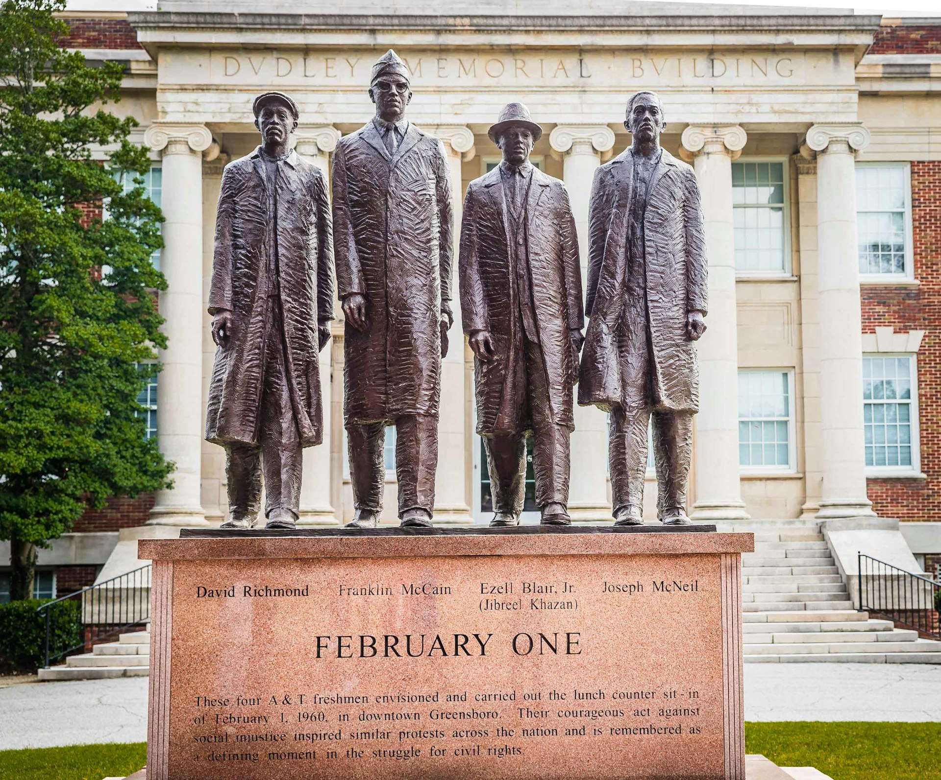 A statue of the Greensboro Four outside the Dudley Memorial Building on North Carolina A&T