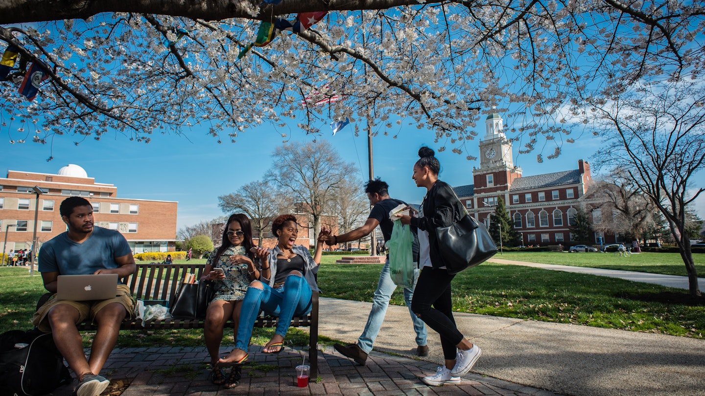 WASHINGTON, DC -- MARCH 18: From left: freshman Tevin Heath, and juniors Ambriel Weatherly, Brianna Brown, David Nesbeth and Shelice Dwyer socialize between classes on the Yard. .Founded in 1867, Howard University is one of the elite HBCU's in the country, but revenue and administration problems plague the instititution and threaten its status. (photo by Andre Chung for The Washington Post via Getty Images)