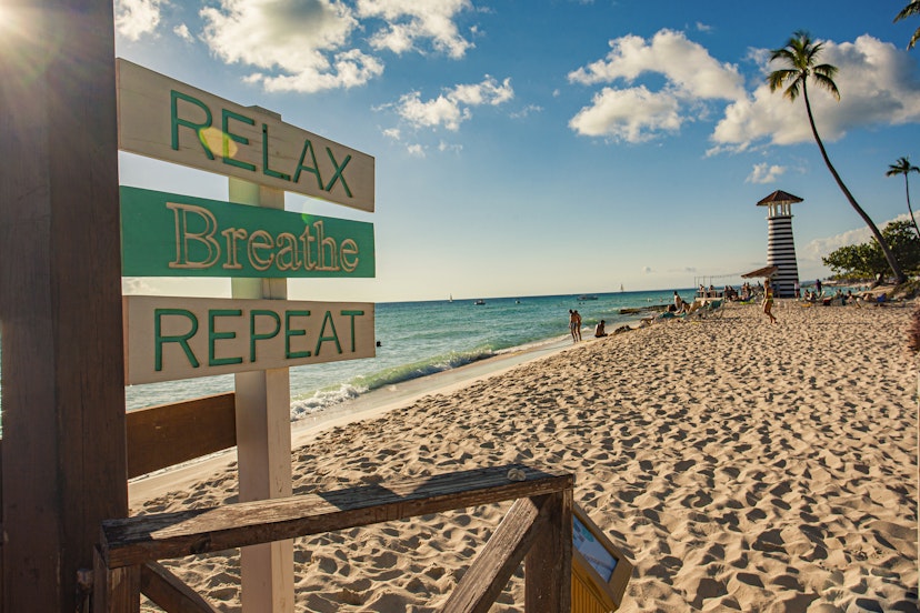 Relax Breathe Repeat sign in Dominicus beach