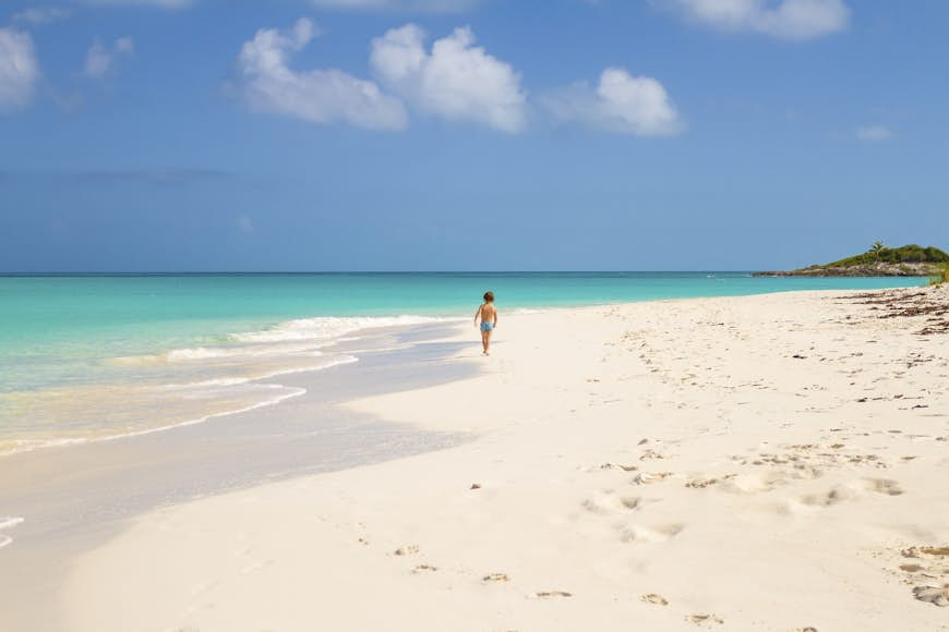 Child running in Tropic of Cancer Beach - Bahamas