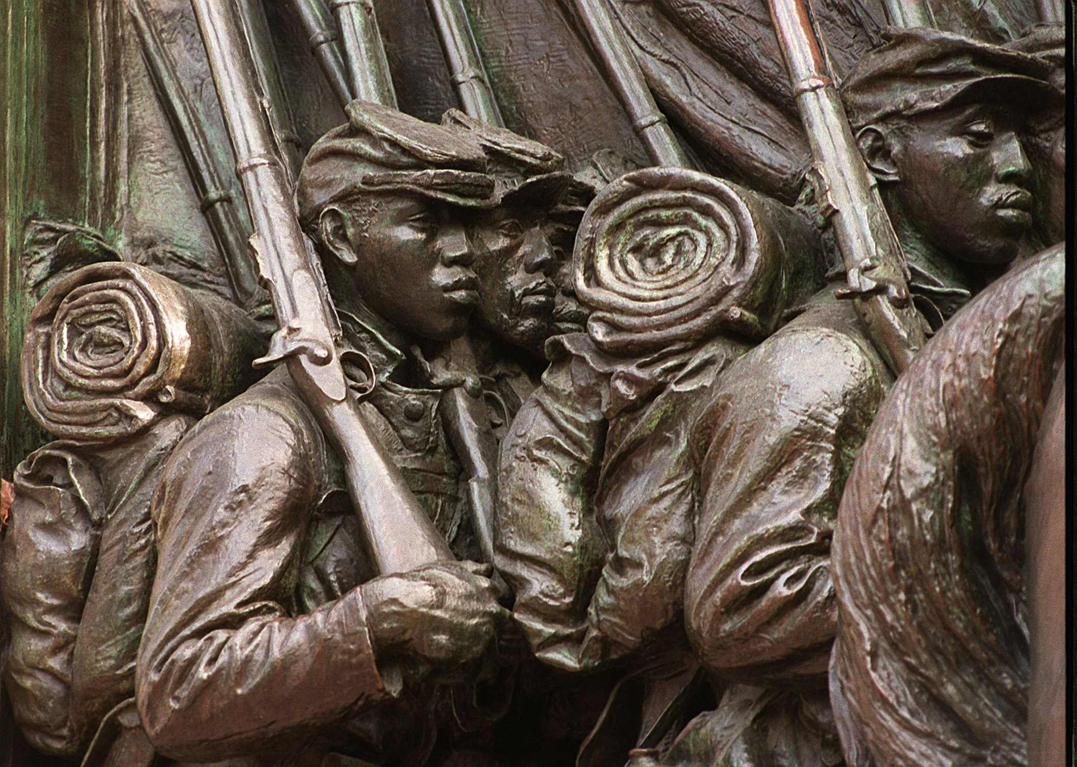 A close up of soldiers faces' on the Memorial To Robert Gould Shaw And 54th Regiment sculpture in Boston