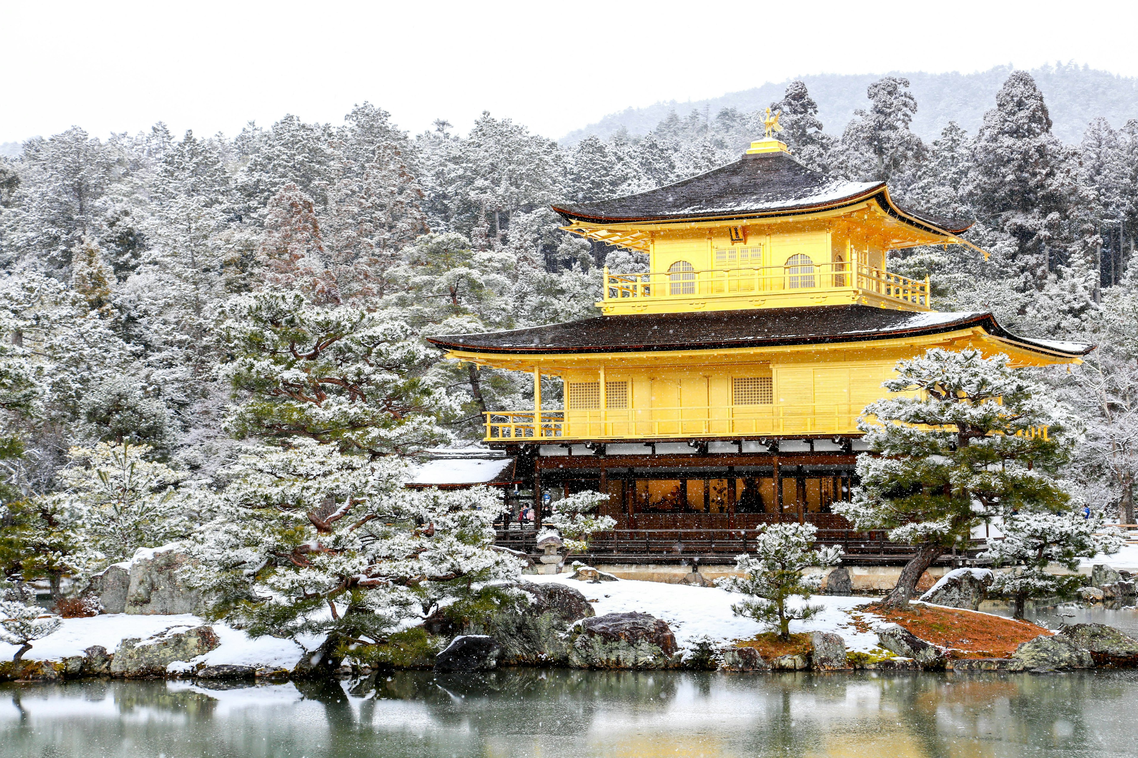 The Golden Pavilion surrounded by snow during winter in Kyoto