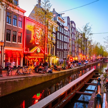 AMSTERDAM, NETHERLANDS - MAY 5, 2016: Night wiev of Red light district in Amsterdam, Netherlands