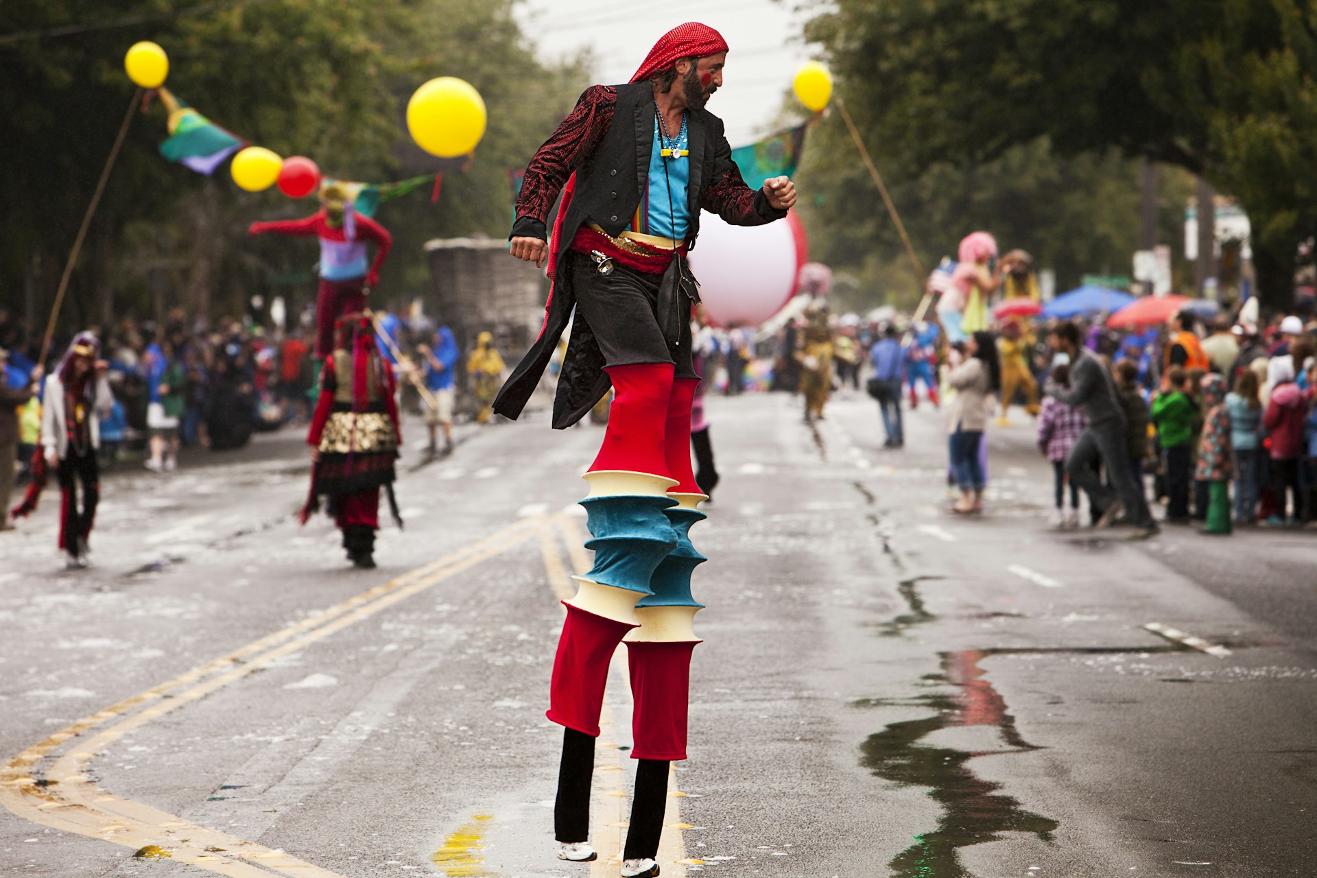 A stilt walker in a parade