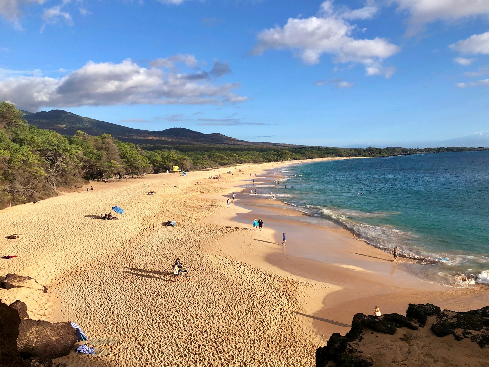 A wideangle of a large golden-sand beach