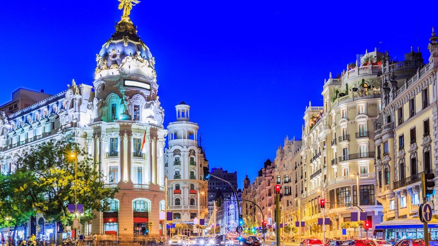 Madrid, Spain. Gran Via, main shopping street at twilight.
