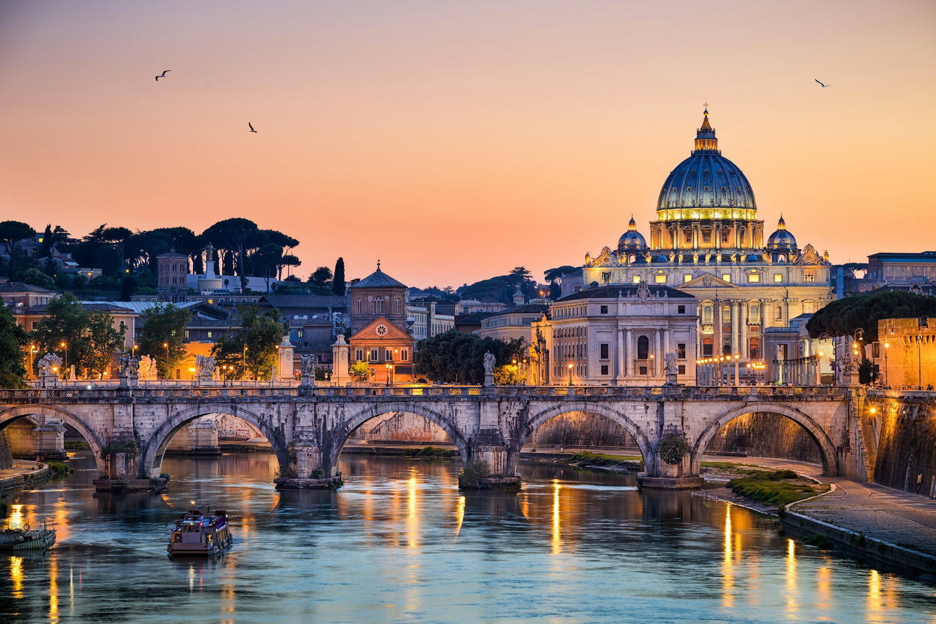 An ancient bridge stands in front of St. Peter's Basilica in Rome. 