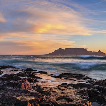 Table Mountain and Cape Town at sunset, from Bloubergstrand.