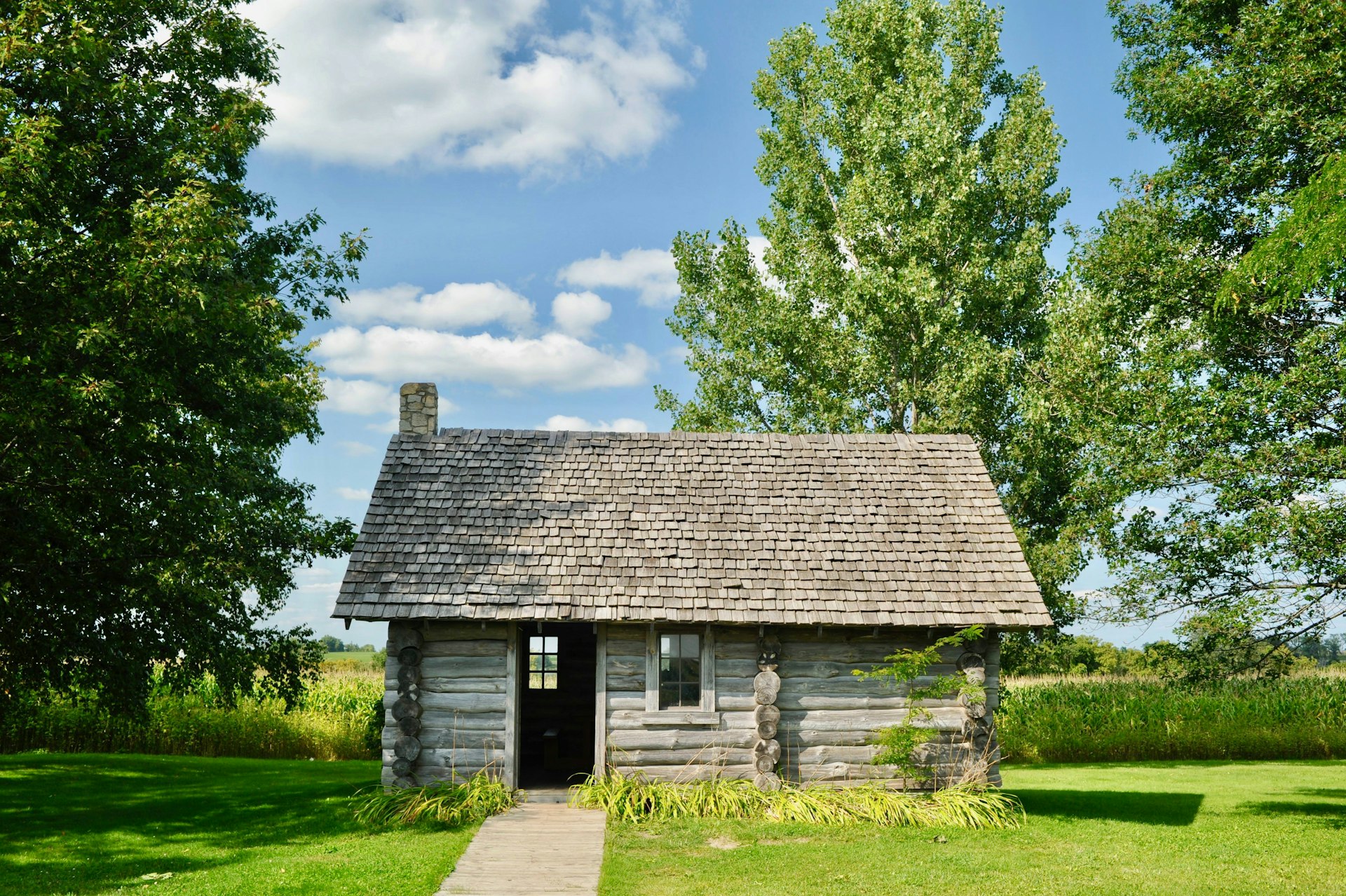 Log cabin replica at the site of Laura Ingalls Wilder's birthplace, setting for book Little House in the Big Woods, Pepin, Wisconsin, USA