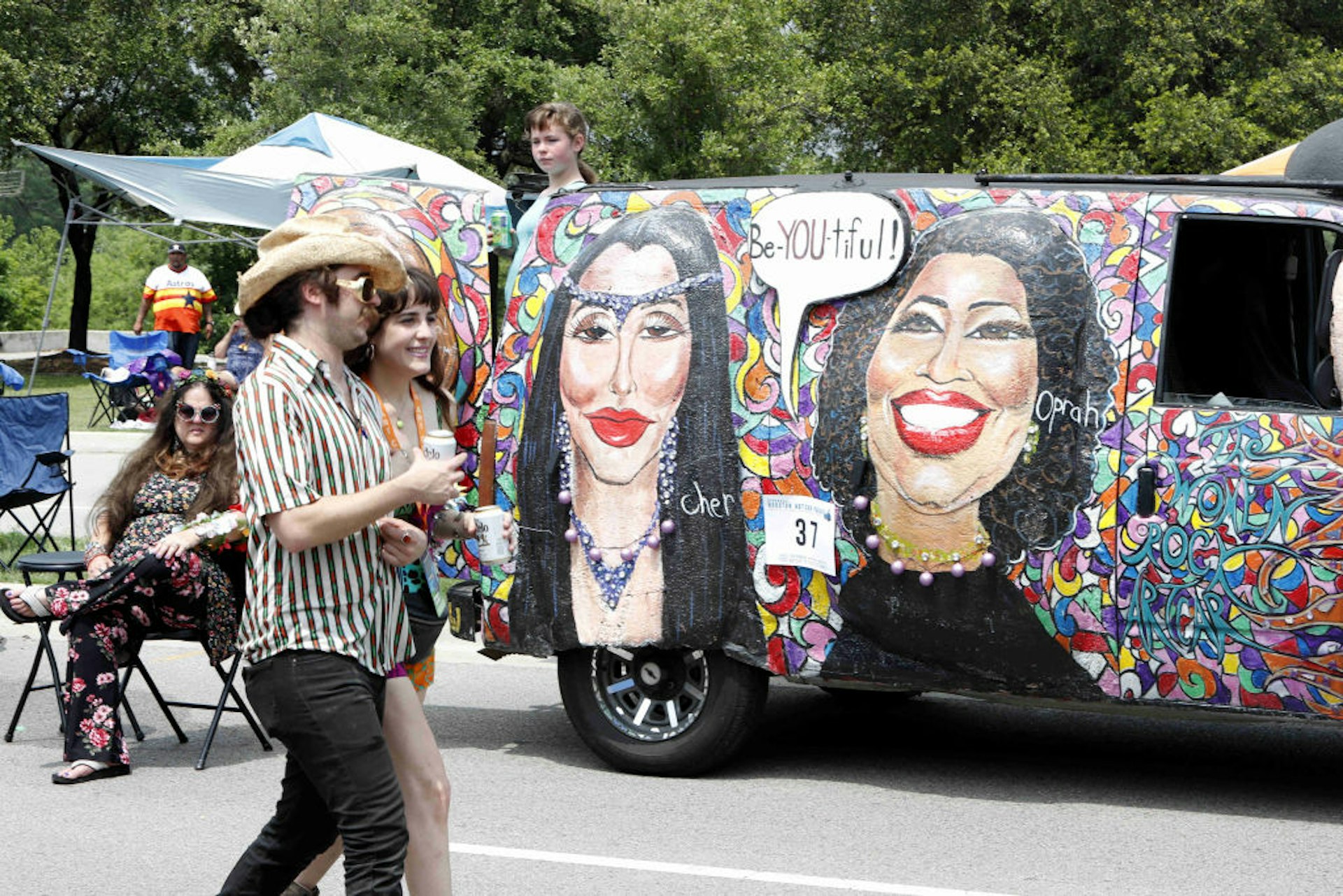  People pass by the mobile masterpiece in Houston, Texas, the United States on April 13, 2019. The 32nd Annual Houston Art Car Parade is the world's oldest and largest Art Car Parade.