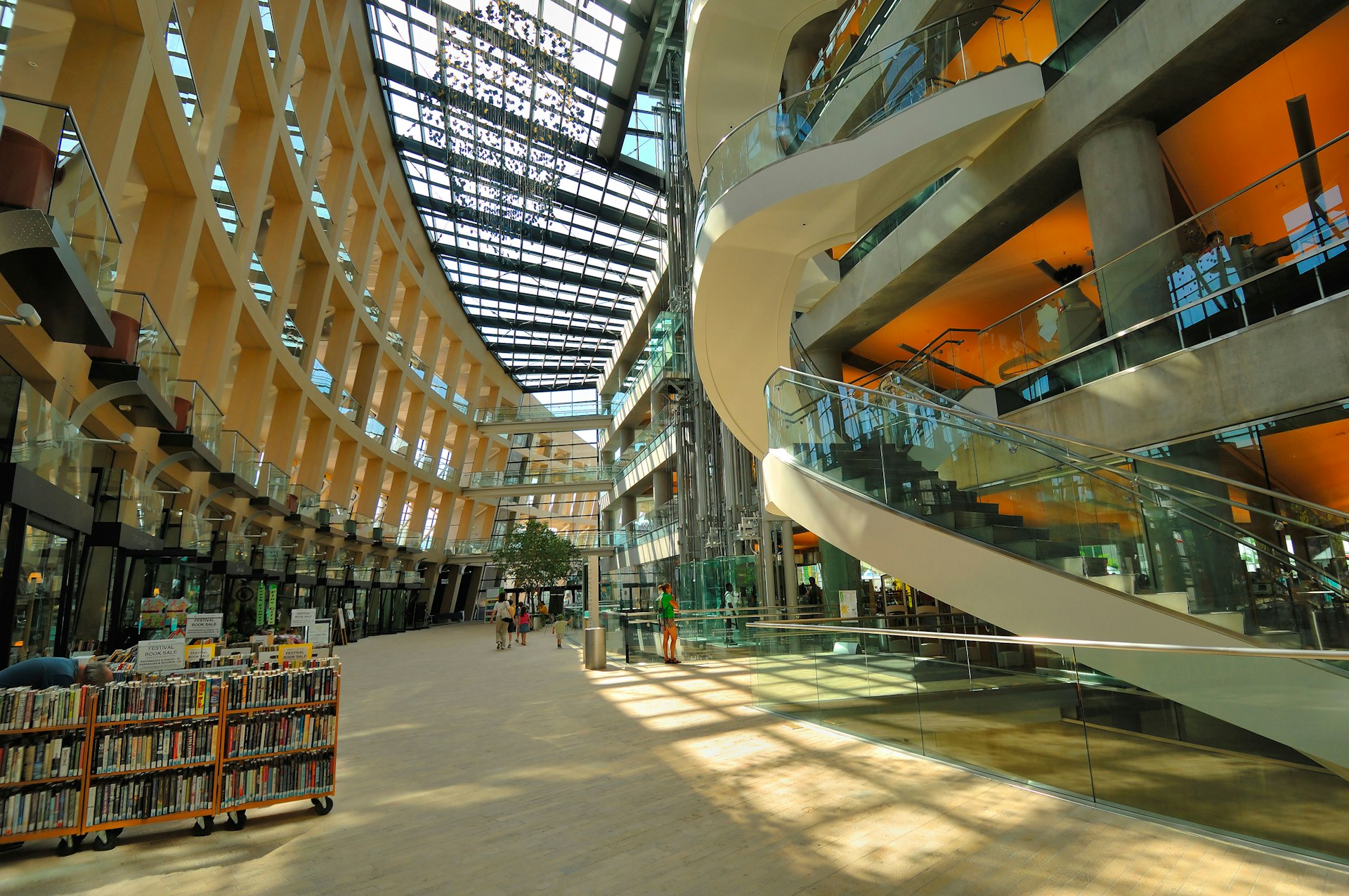 The modern atrium with stairwells, hallways and racks of books at Salt Lake City Public Library