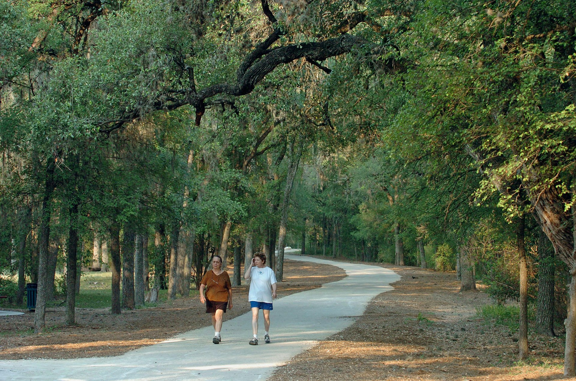 Jun 29, 2006; San Antonio, TX, USA; Aggie Eyster (left) and Ann Parker do their morning walk in Brackenridge Park.  Mandatory Credit: Photo by Tom Reel/San Antonio Express-News/ZUMA Press. (©) Copyright 2006 by San Antonio Express-News