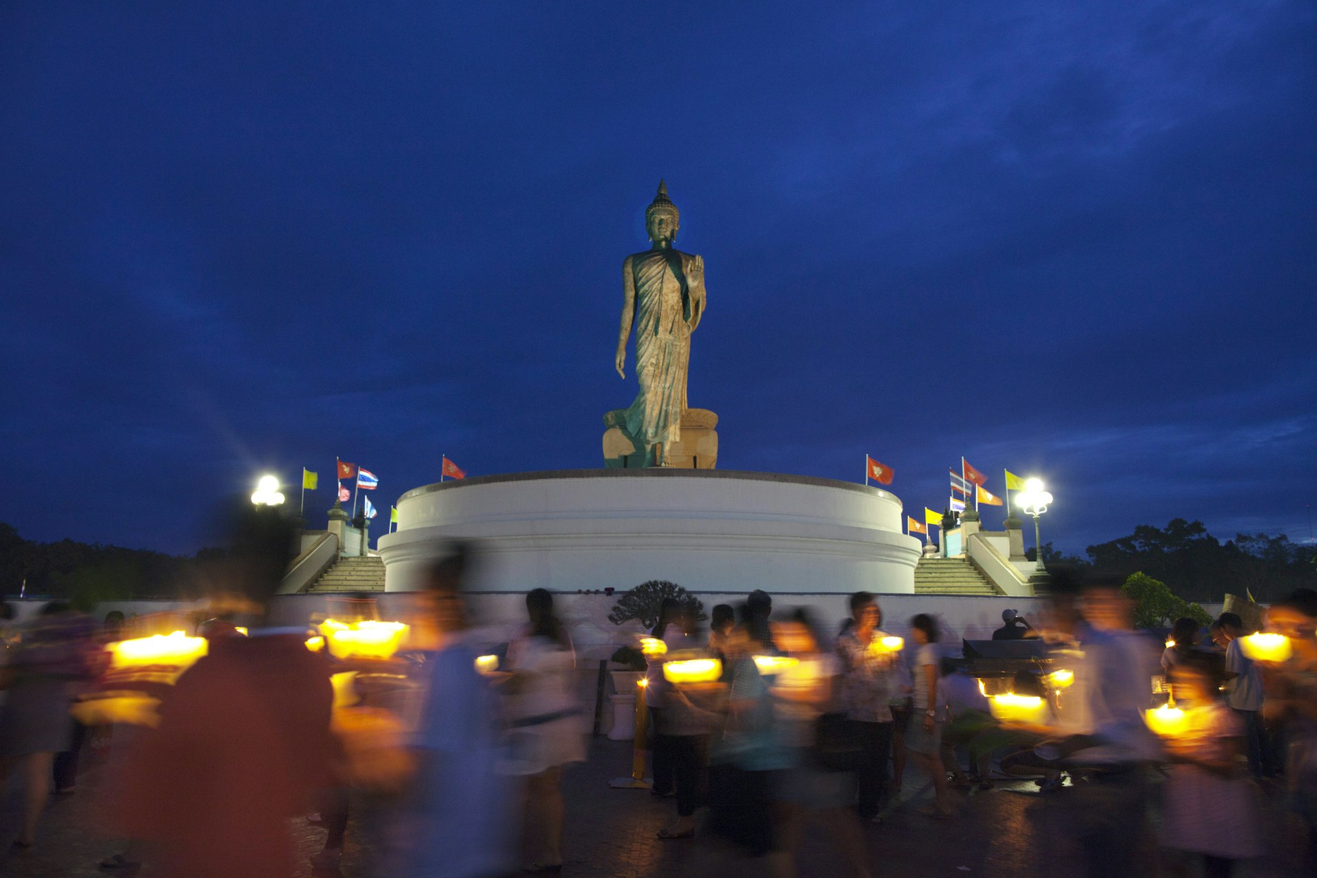 Thai's celebrate the beginning of Buddhist Lent  with a candle ceremony July 15, 2011 at the Phutthamonthon temple in Nakhon Pathom Province west of Bangkok, Thailand. Buddhists walk clockwise around the highest free-standing statue of Buddha in the world.