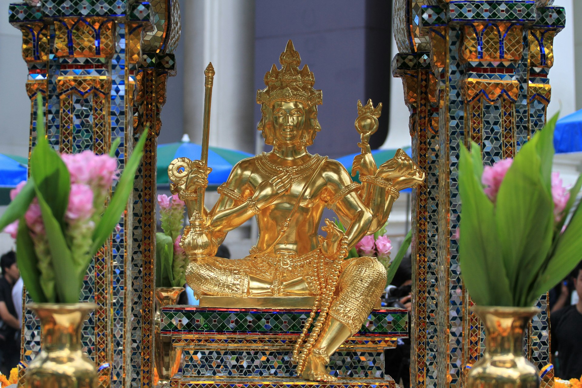 The restored golden statue of Lord Brahma (Phra Phrom) after the craftsmen from the Thai Fine Arts Department repaired the Erawan Shrine following a bombing.